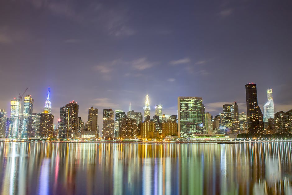 A breathtaking view of the New York City skyline illuminated at night